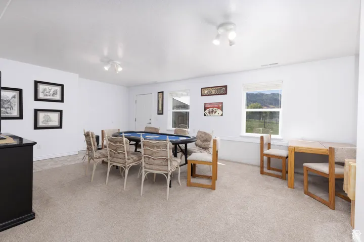 Dining space with light carpet
