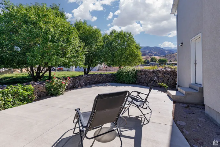 View of patio featuring a mountain view