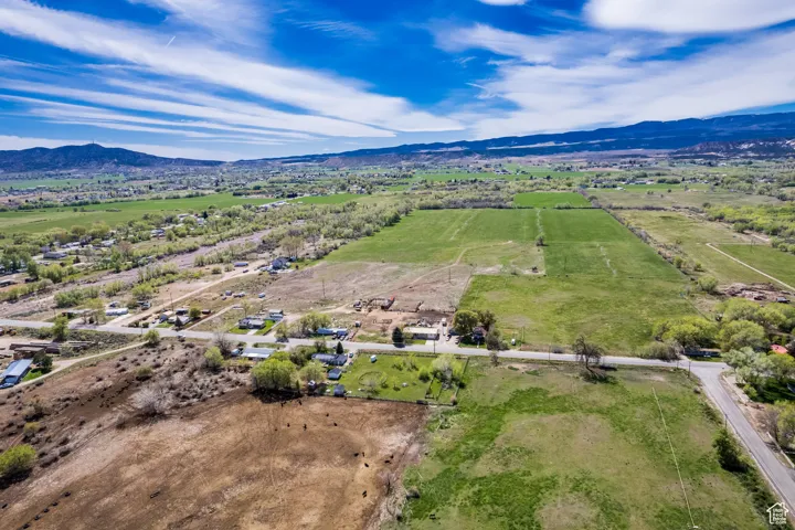 Drone / aerial view featuring a rural view and a mountain view