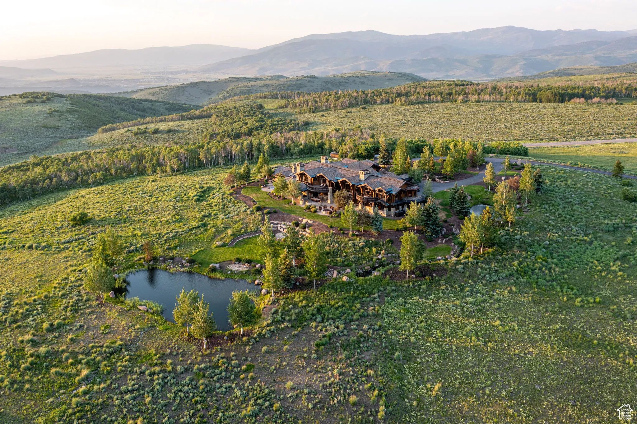View of property location featuring a water and mountain view