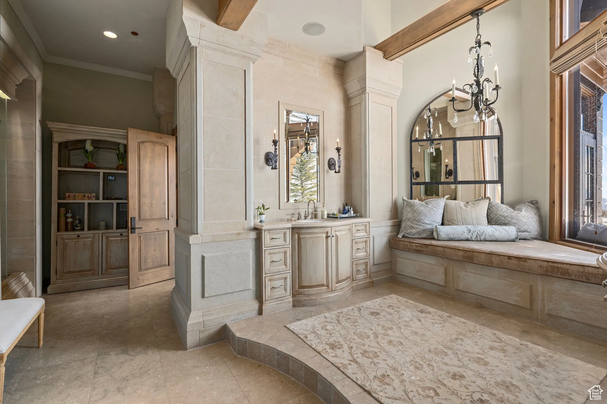 spa like Bathroom featuring recessed lighting, a notable chandelier, crown molding, and vanity