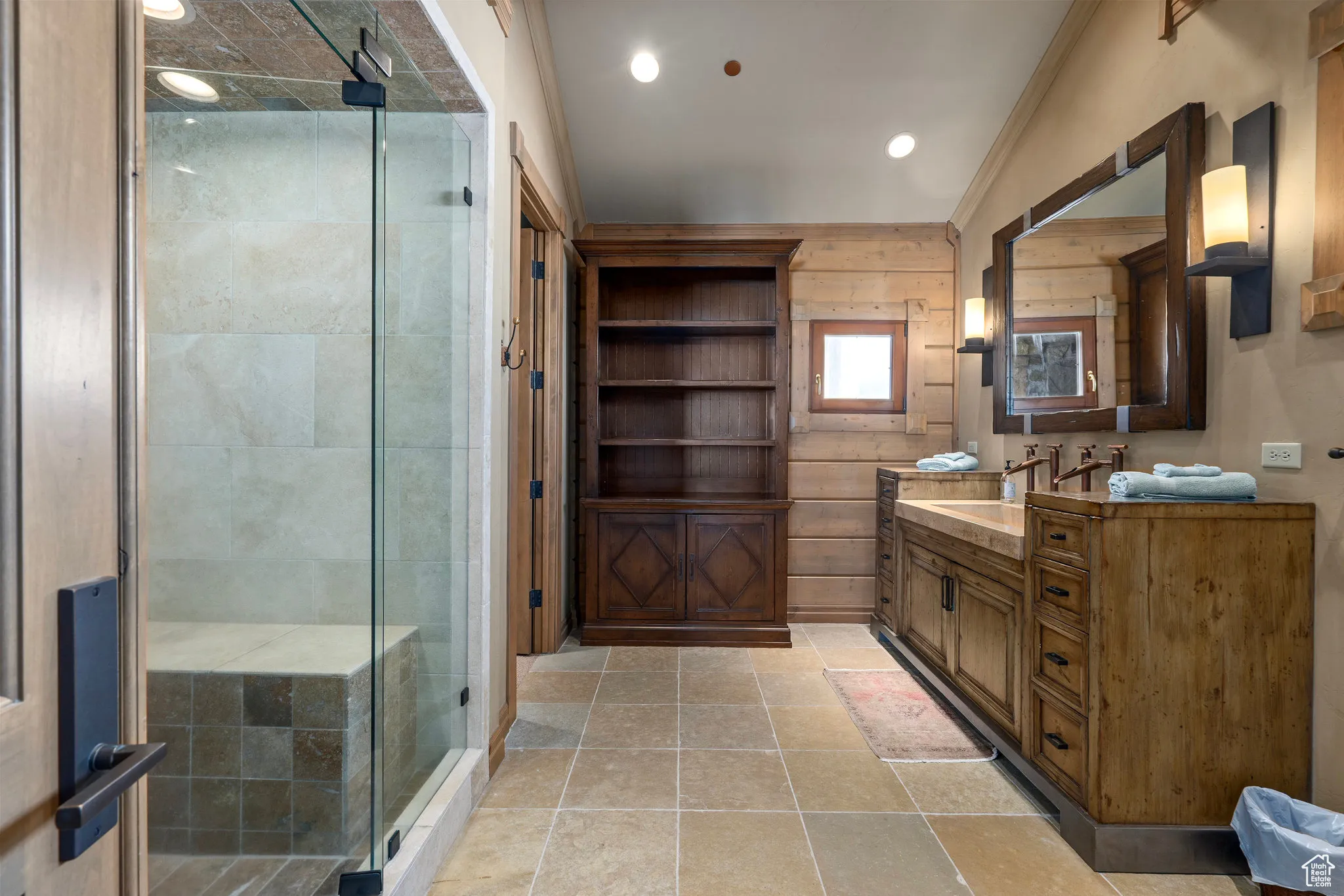 Full bath featuring a stall shower, vanity, and recessed lighting