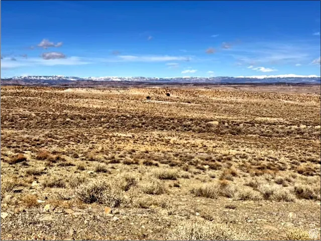 View of landscape featuring a desert view and a mountain view