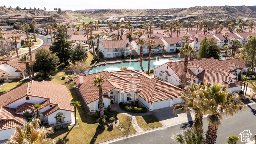 Birds eye view of property with a residential view and a mountain view