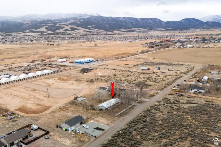 Bird's eye view with a rural view, a mountain view, and view of desert