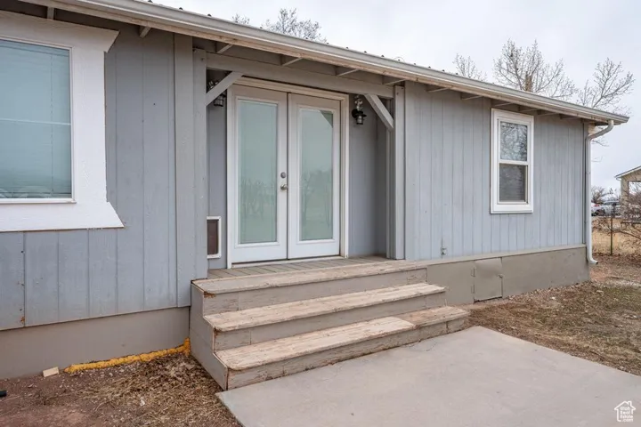 Doorway to property with french doors
