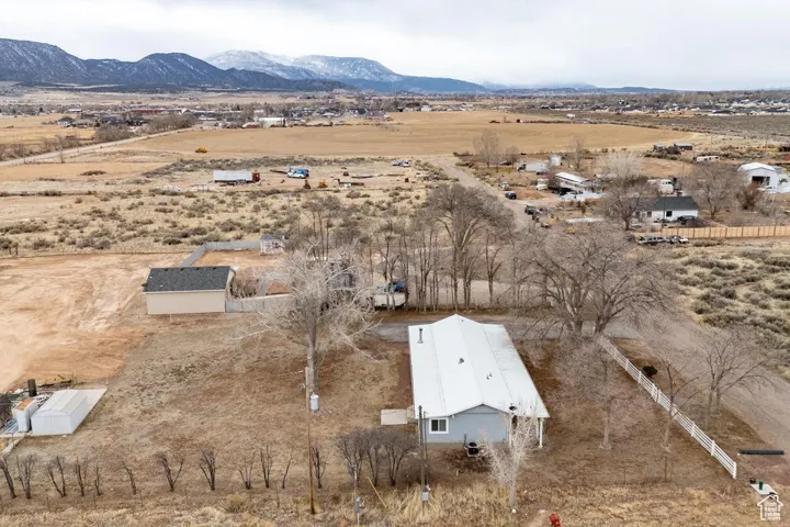Aerial view with view of desert, a rural view, and a mountain view