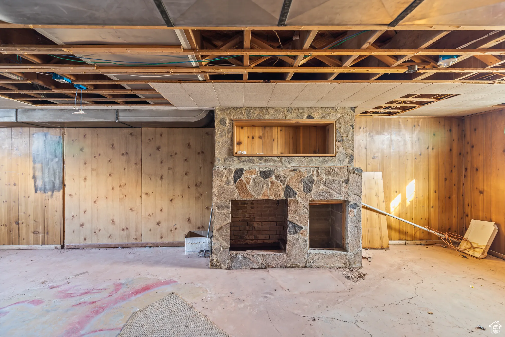 Below grade area with wooden walls