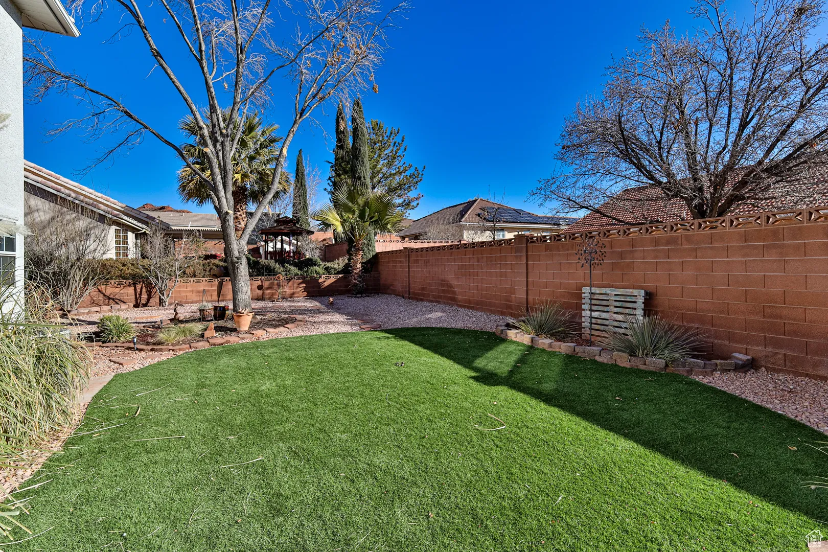 View of yard with a fenced backyard