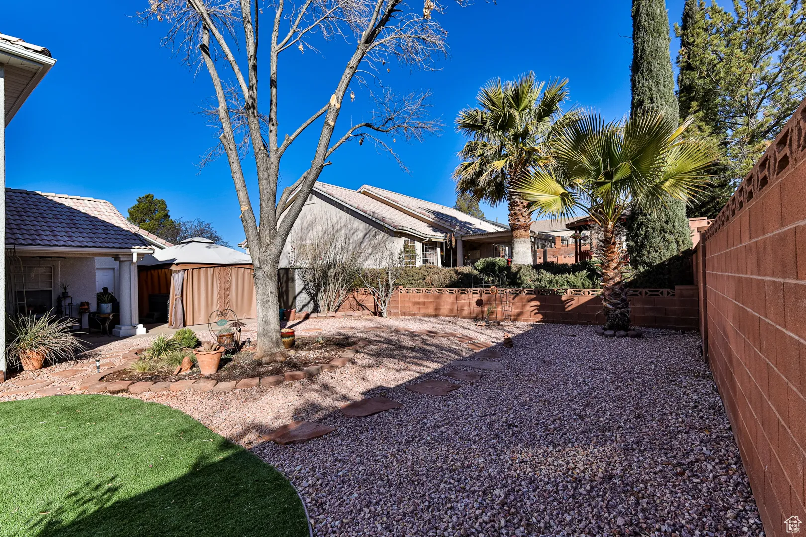 View of yard with a patio and a fenced backyard