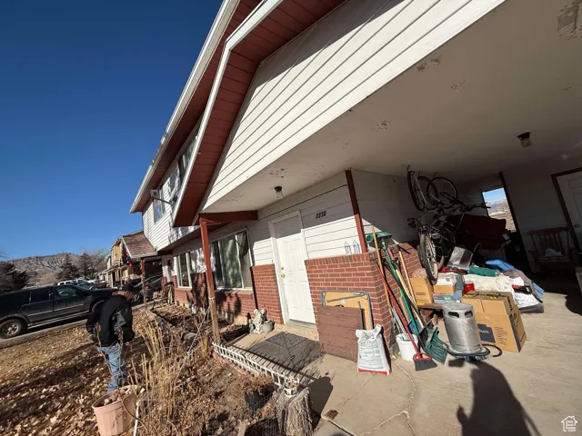 View of side of property with brick siding