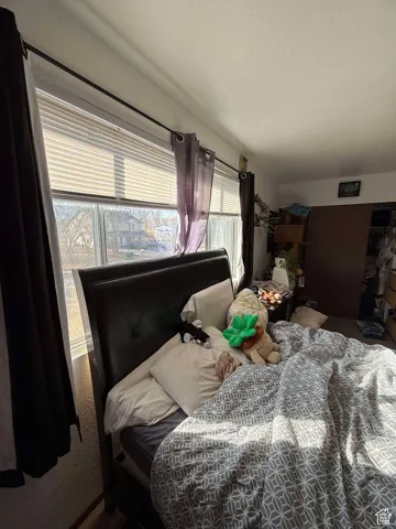 Bedroom with a textured ceiling