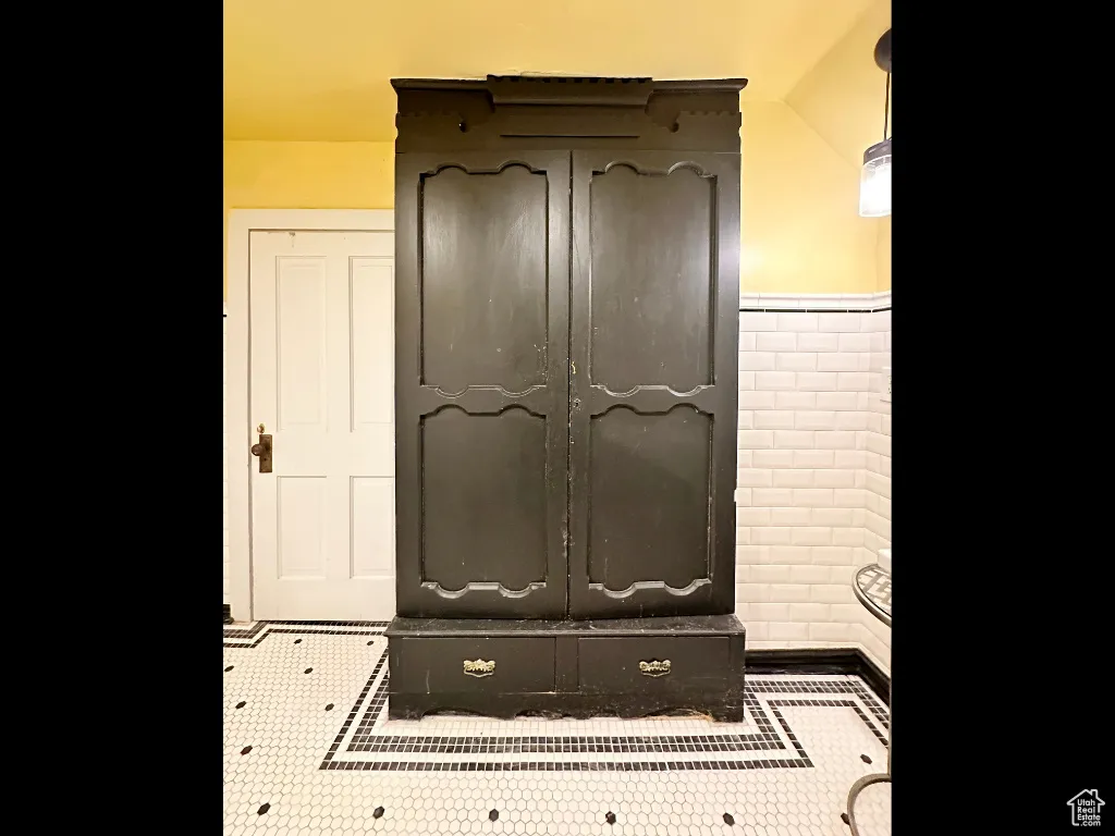 Room details with a wainscoted wall