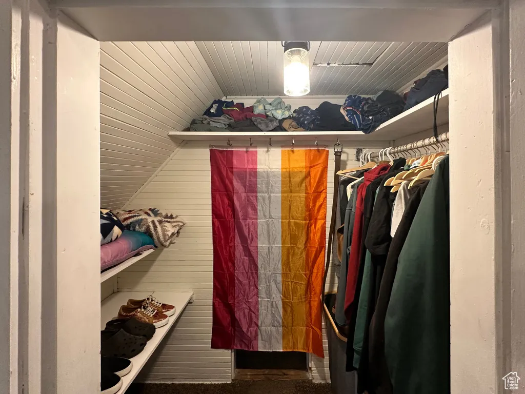 Spacious closet featuring lofted ceiling