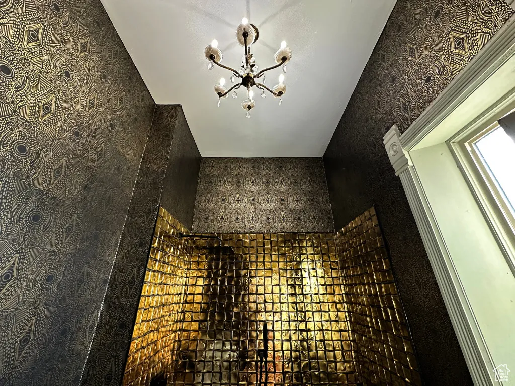 Room details featuring a notable chandelier