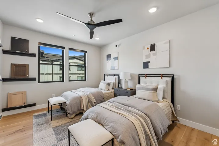 Bedroom with recessed lighting, baseboards, ceiling fan, and light wood finished floors