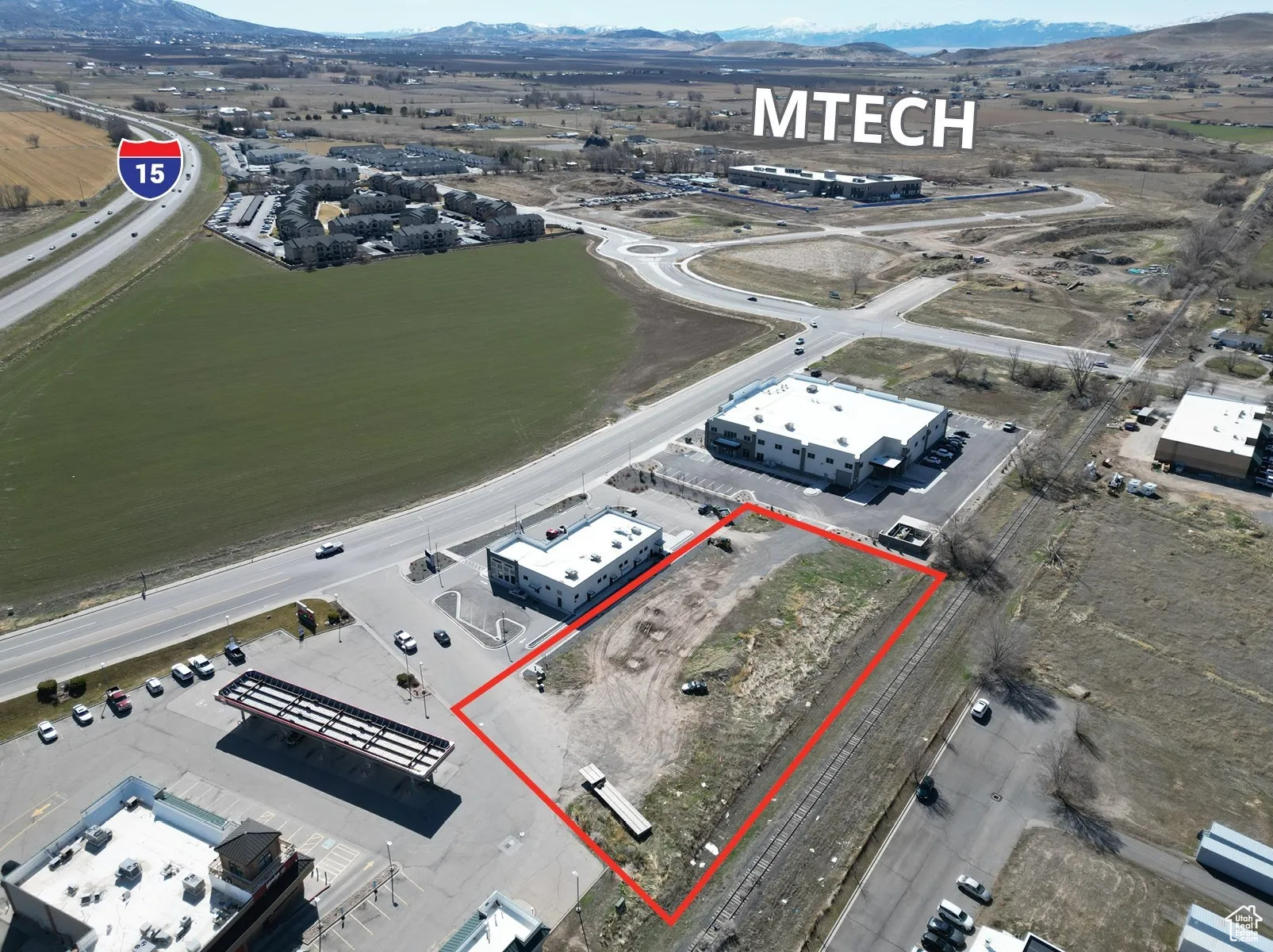 Birds eye view of property with a mountain view