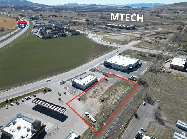 Birds eye view of property with a mountain view