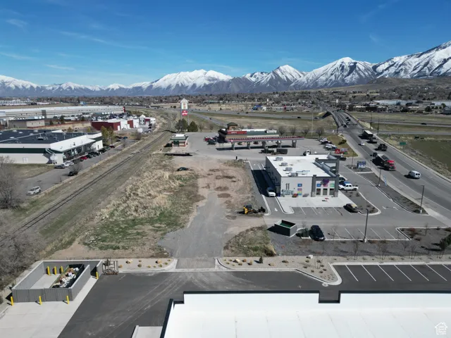Birds eye view of property with a mountain view