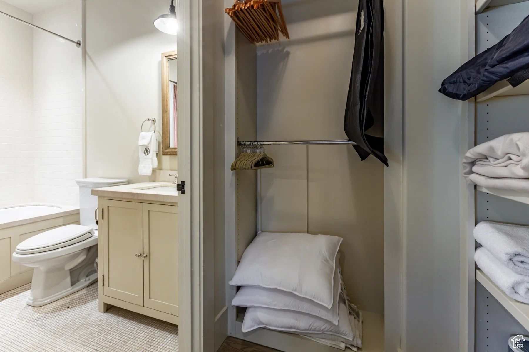 Full bath with toilet, tub / shower combination, and vanity