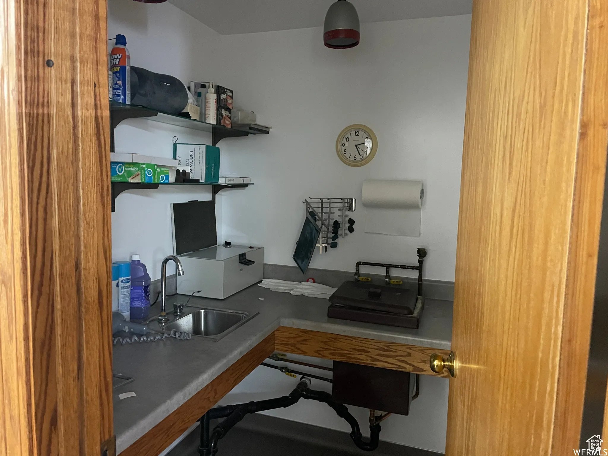 Home office featuring a sink