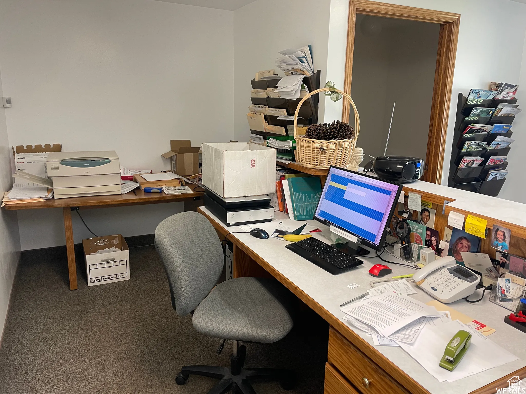 View of carpeted home office