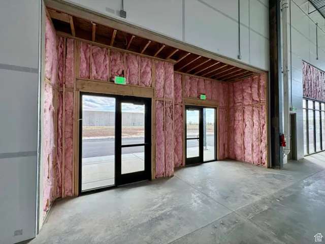Interior space with unfinished concrete floors