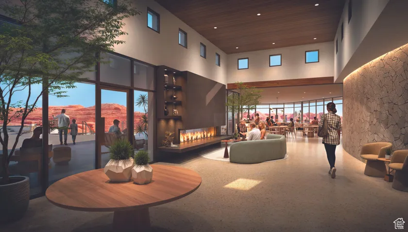 Lobby with a mountain view, wooden ceiling, a high ceiling, recessed lighting, and a wall of windows