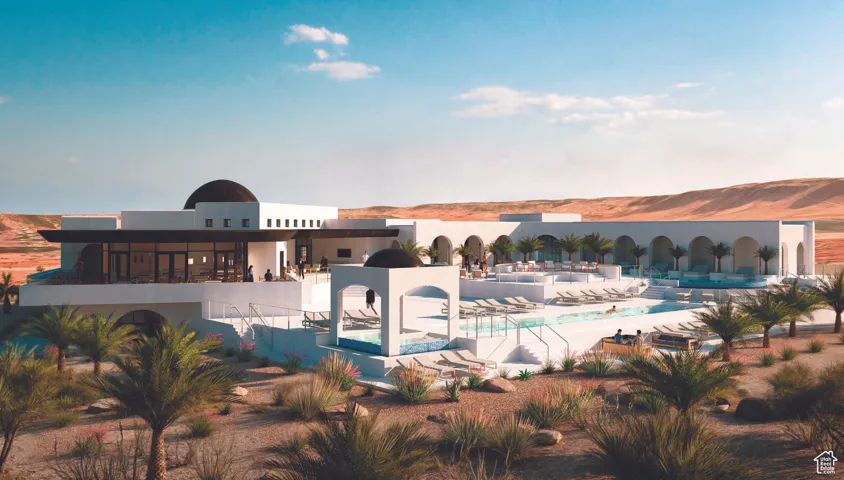 Community pool featuring a patio and a mountain view