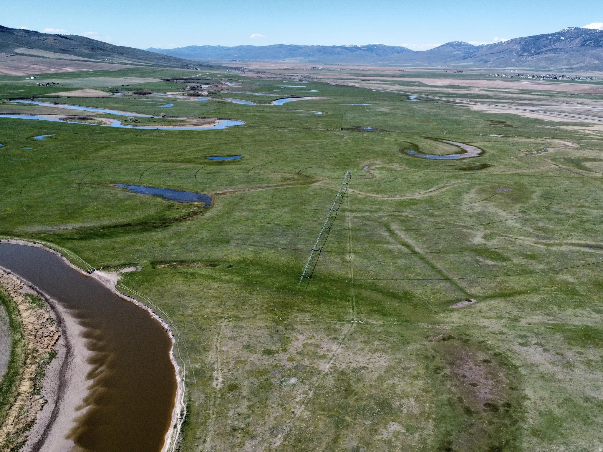 View of property location featuring a water and mountain view