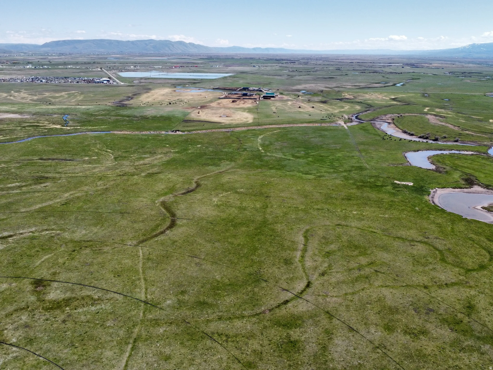 View of property location with a water and mountain view