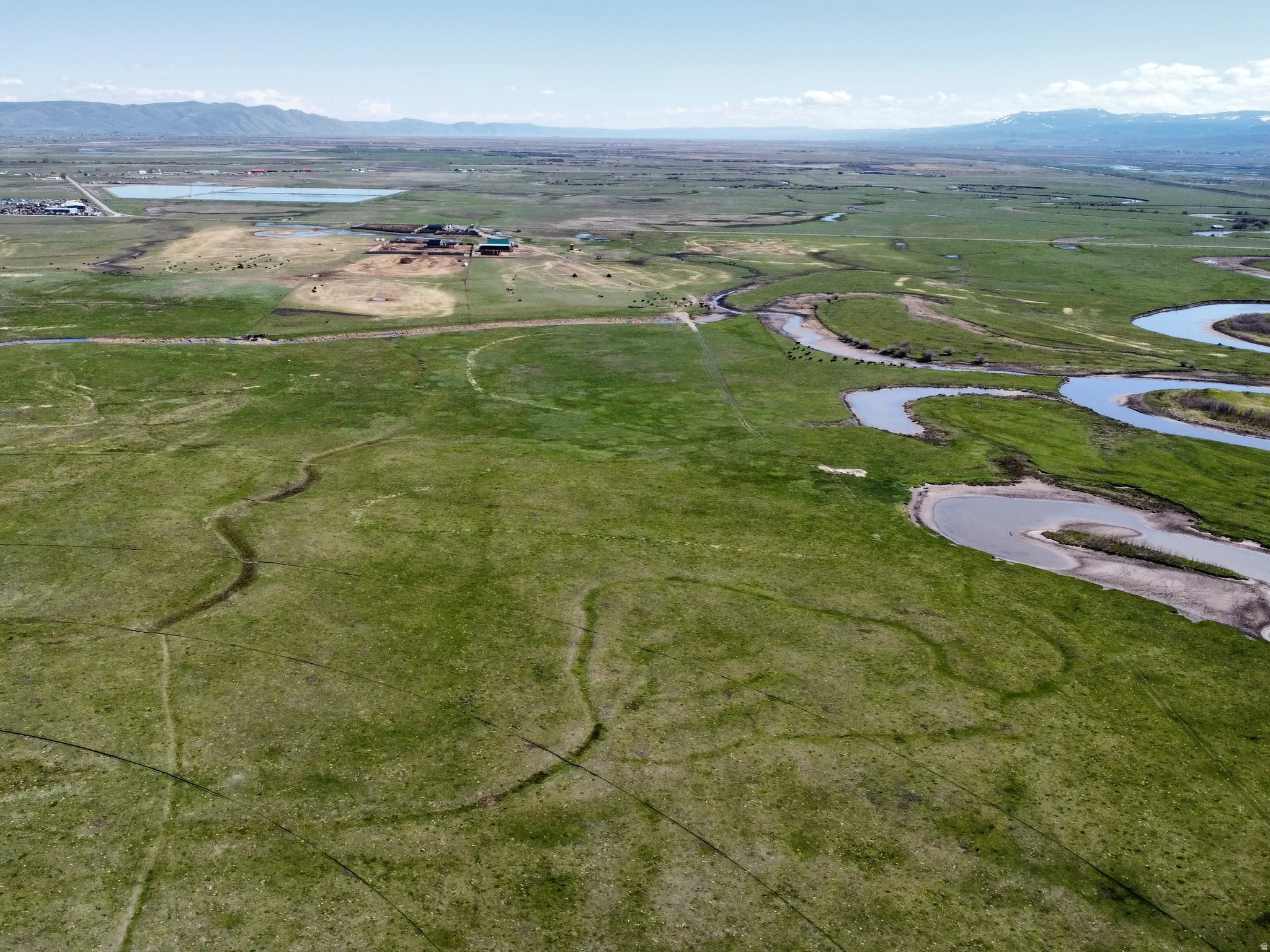View of property location with a water and mountain view