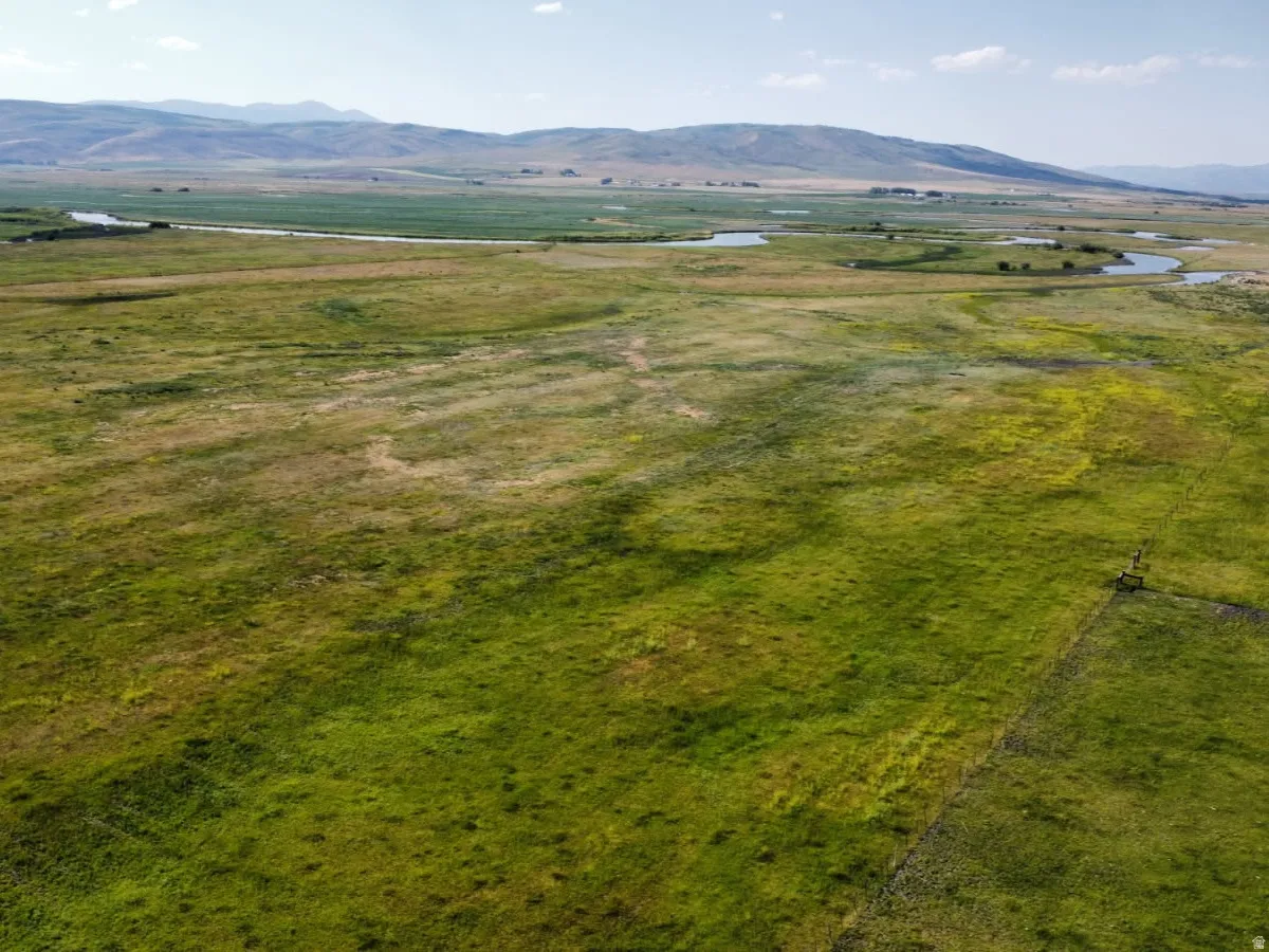 View of rural area with a mountainous background