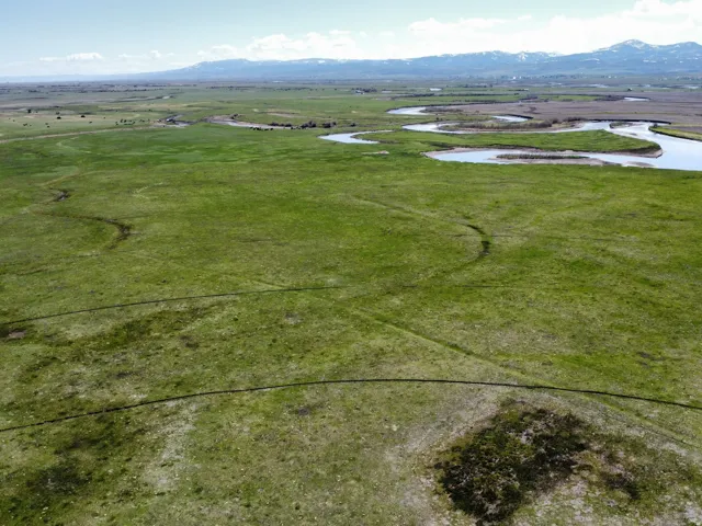 Drone / aerial view of a water and mountain view
