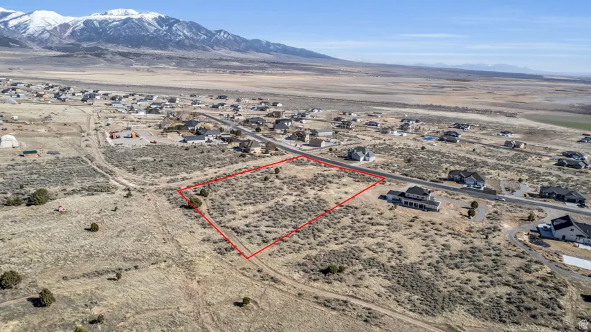 Birds eye view of property with a mountain view, a rural view, and view of desert