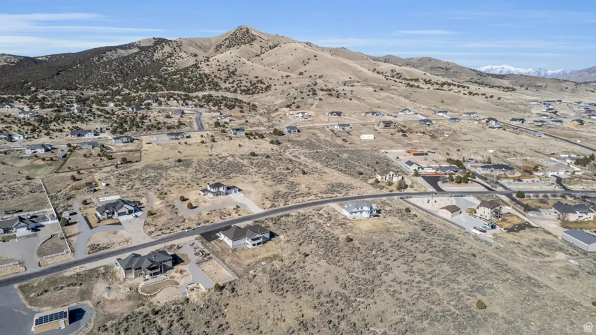 Drone / aerial view with a mountain view and a desert view