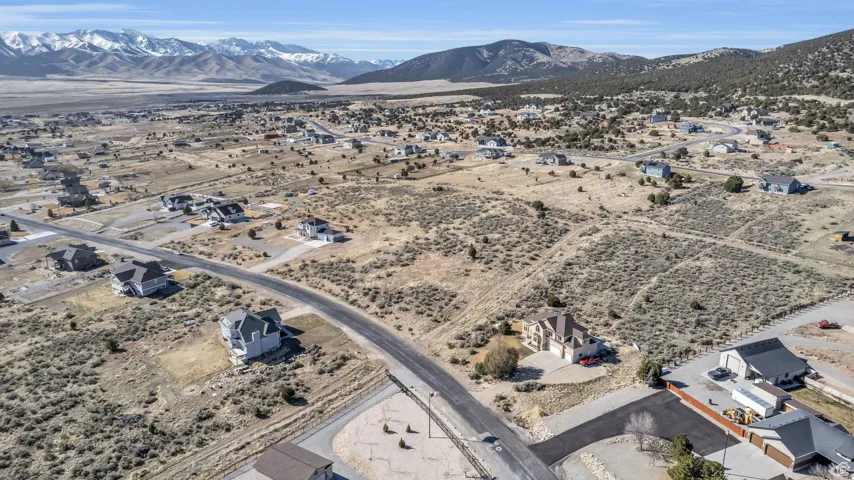 Aerial view featuring a mountain view and a desert view