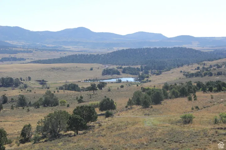 Mountain view featuring a water view