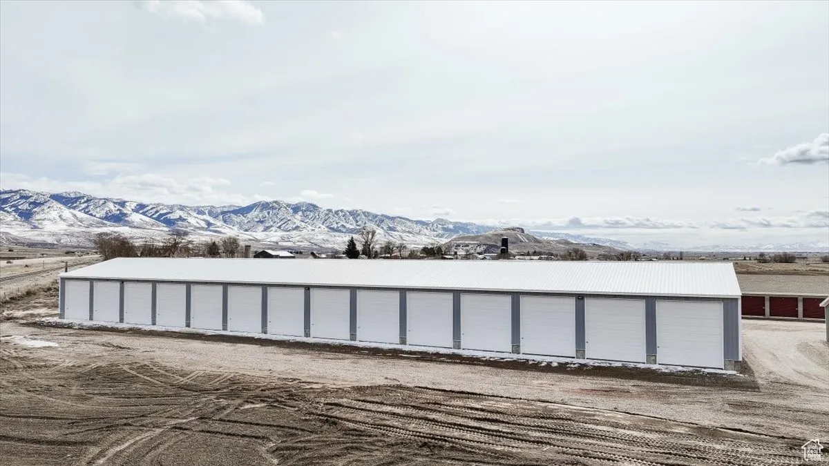 Exterior space featuring community garages and a mountain view