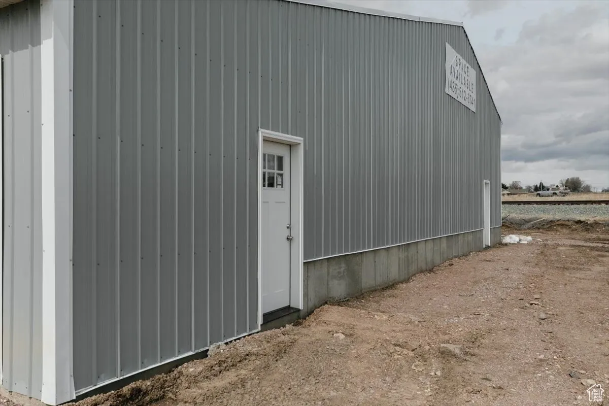 View of outbuilding with an outdoor structure