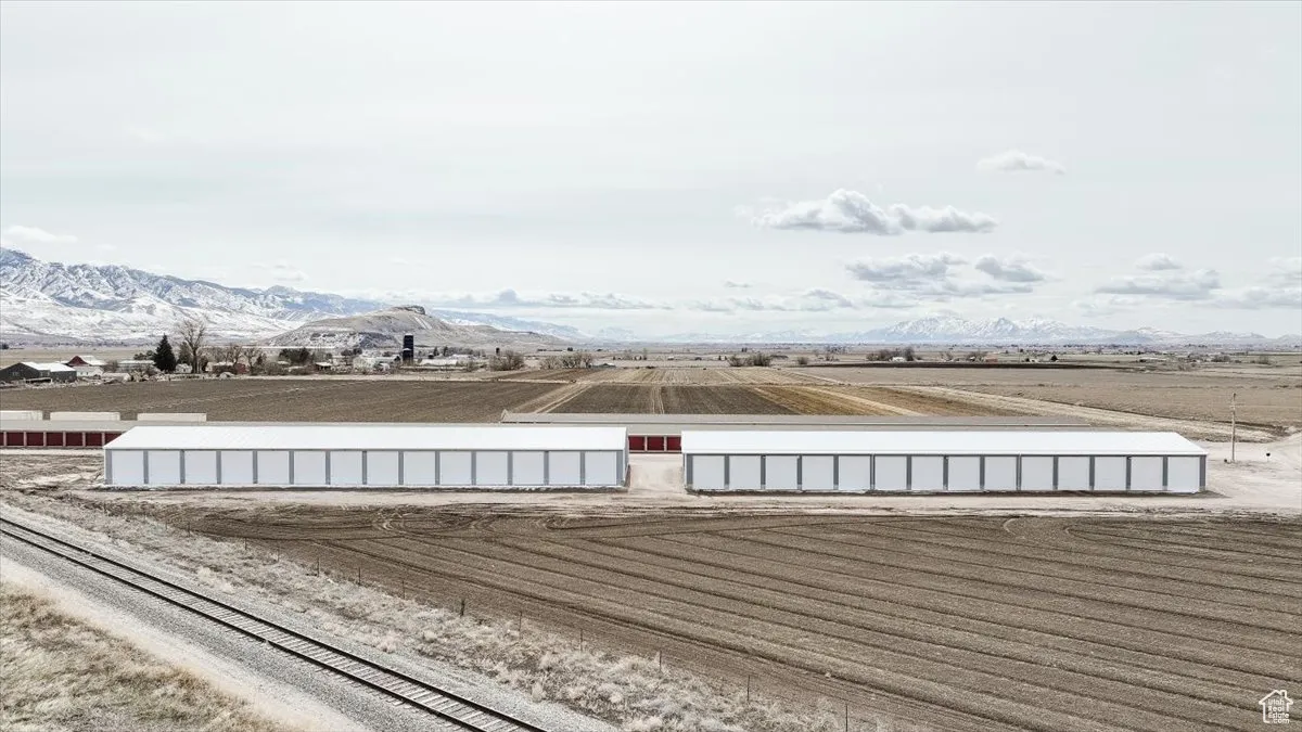 Wooden deck featuring a mountain view