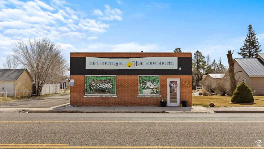 Exterior space featuring brick siding