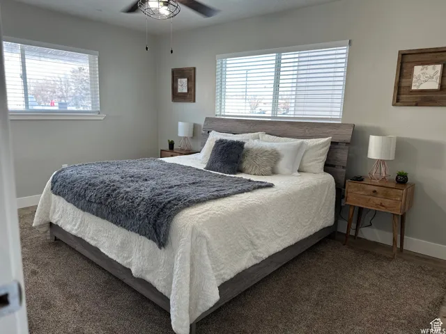 Bedroom featuring baseboards and a ceiling fan