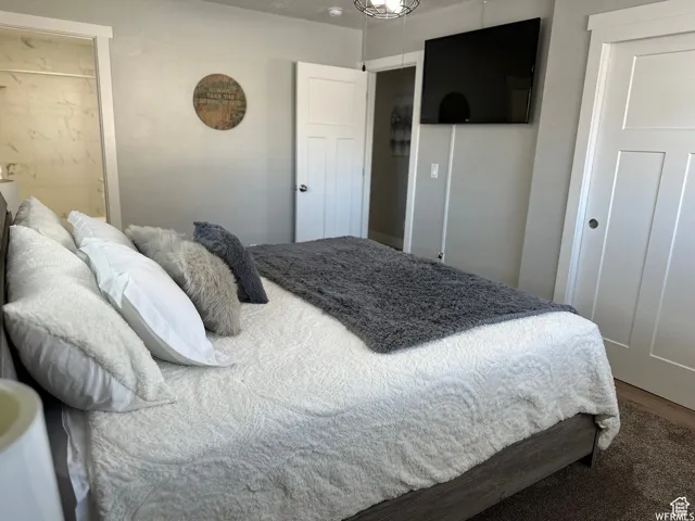 Bedroom with wood finished floors