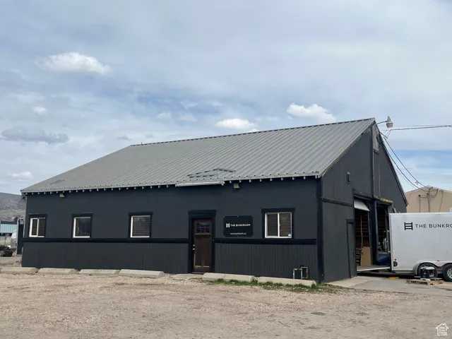 View of front facade featuring metal roof