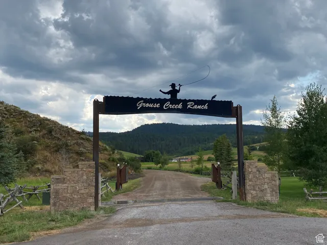 View of road featuring driveway and a mountain view