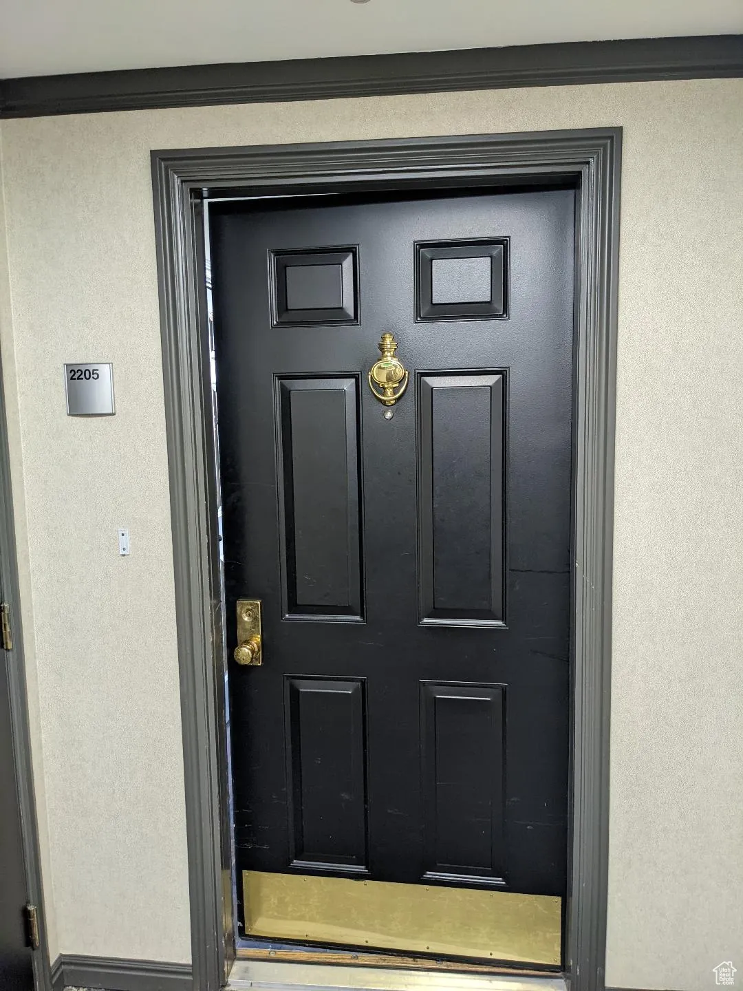 View of exterior entry to condo.