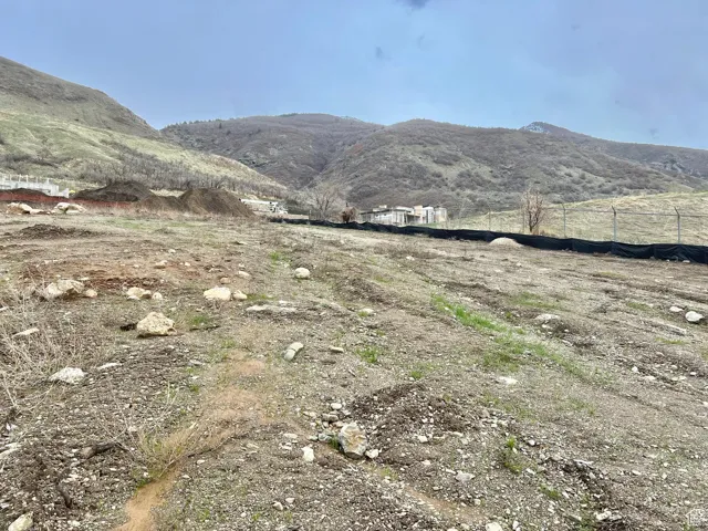 Property view of mountains featuring a rural view