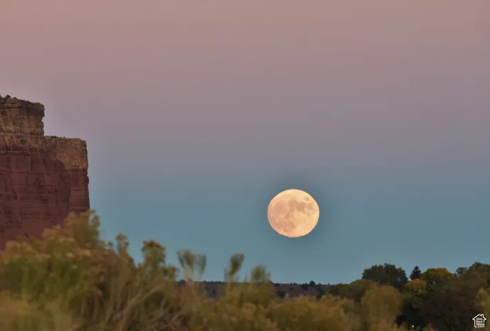 Moon rise during sunset over Capitol Reef National Park