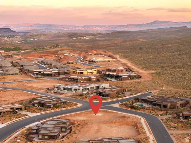 Aerial view at dusk with a mountain view and a residential view